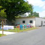 The front view of the Lois Ballard Modular Building that includes classrooms and a music room for the Preschoolers.